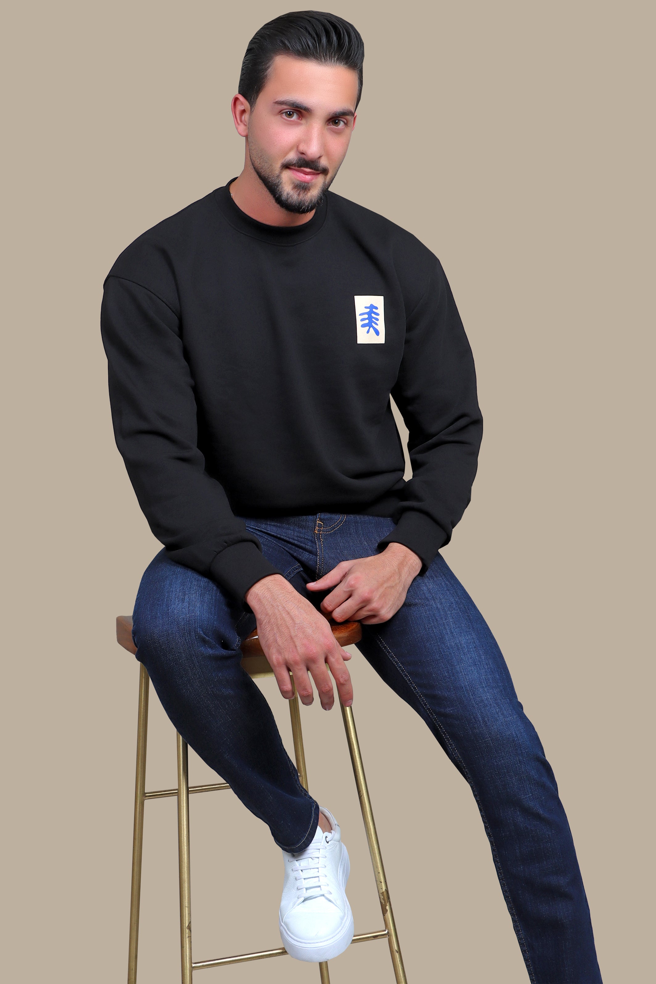 Expressive Edge: Black Sweatshirt with Back Face Print