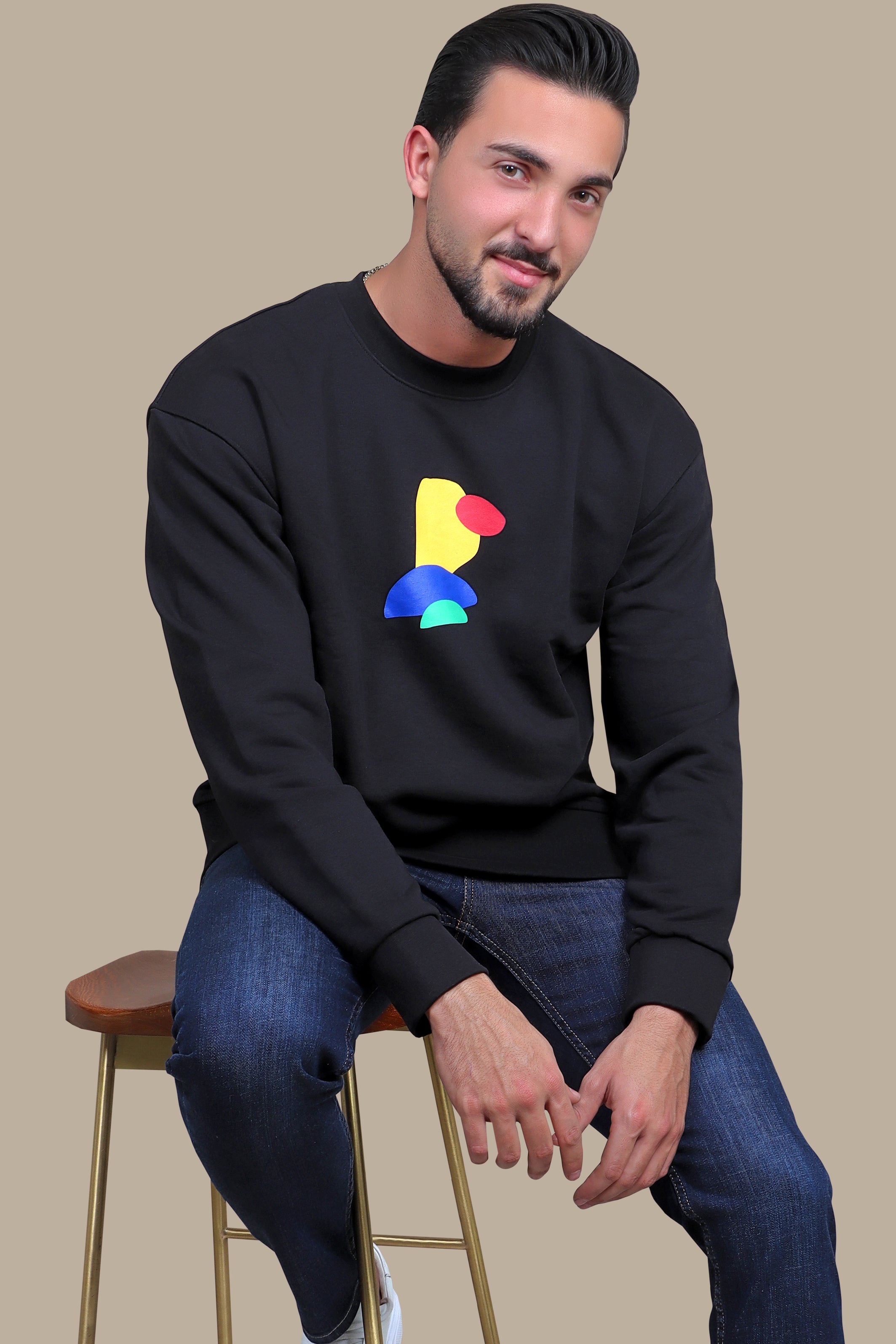 Subtle Statements: Black Sweatshirt with Small Print Accents